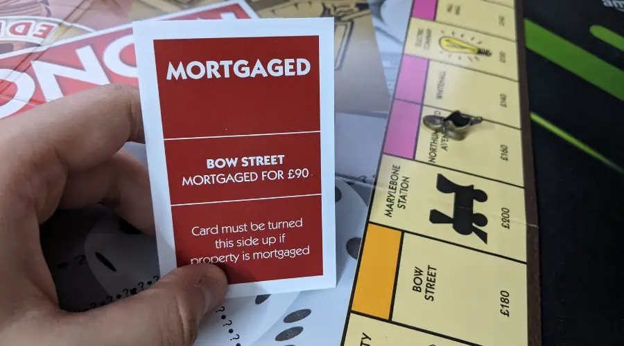 can you buy mortgage property in monopoly?